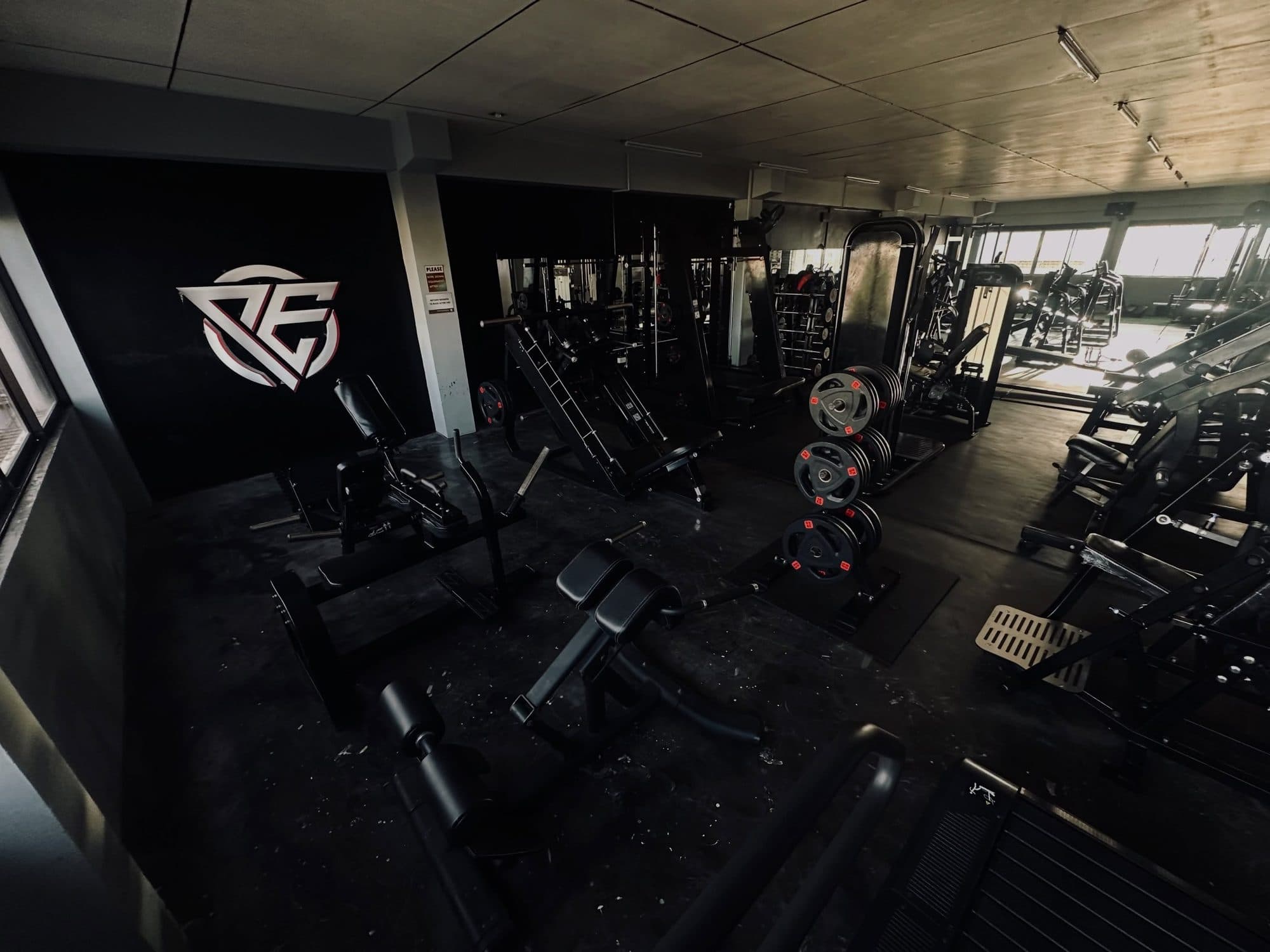 The gym floor beneath the Project-E wall logo