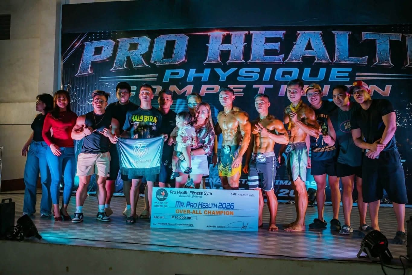The Project-E team gathered on stage with a banner